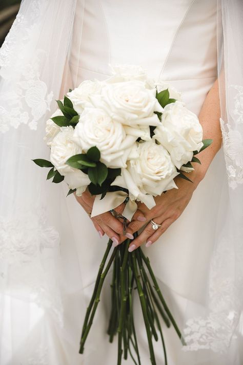 Classic white rose wedding bouquet with long stems worn by bride with rounded pink nails | Weddings By Nicola and Glen Manor House Castle Combe, Classic Wedding Bouquet, White Rose Wedding, White Rose Wedding Bouquet, House Castle, Strapless Wedding Dress Mermaid, White Rose Bouquet, The Manor House, Castle Combe