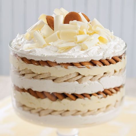 white-chocolate-banana-pudding Banana Pudding Trifle Paula Deen, White Chocolate Banana Cream Pie, Pudding Dessert Ideas, Paula Dean Banana Pudding, White Chocolate Banana Pudding, Chessman Banana Pudding, Banana Pudding Paula Deen, Pudding Trifle, White Chocolate Banana