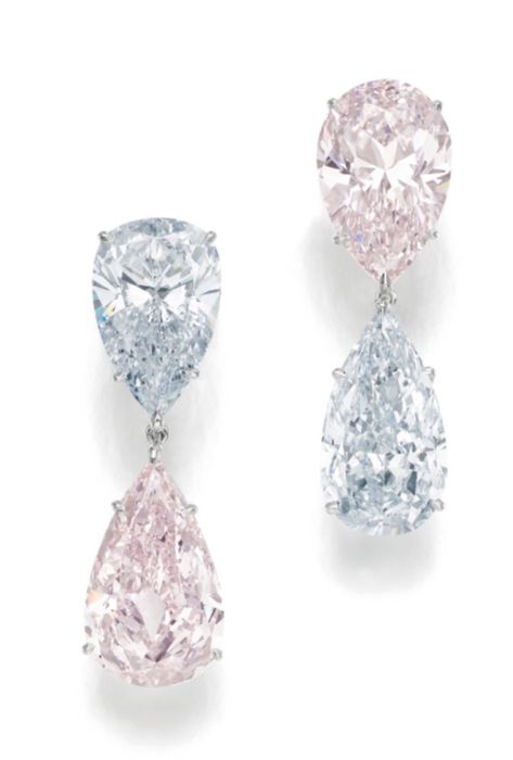 Pair of important fancy light blue and fancy light pink diamond pendent ear clips. Each set with a pear-shaped diamond supporting a similarly cut diamond pendant, one set with a fancy light blue diamond weighing 6.41 carats, supporting a fancy light pink diamond weighing 8.03 carats, the other set with a fancy light pink diamond weighing 7.16 carats, supporting a fancy light blue diamond weighing 6.25 carats respectively, clip fittings. Light Blue Diamond, Navy Bracelet, Pink Diamond Earrings, Jewel Earrings, Colored Diamond Jewelry, Fancy Light, Mother Necklace, Diamond Pendent, Pink Sparkles