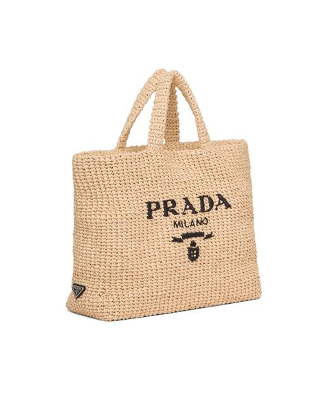 Tan Raffia tote bag | Prada Prada Raffia Tote Bag, Prada Raffia, Tote Crochet, Raffia Tote Bag, Raffia Crochet, Embroidered Tote Bag, Embroidered Tote, Crochet Tote Bag, Woven Raffia