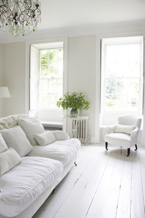 Multiple shades of white mix for glorious cloud-like Country French Nordic White Interiors. Scandinavian style white Nordic French design details as well as spare decor style meet English countryside charm in "The Hatch," a photographic location in Wiltshire. Design: Atlanta Bartlett & Dave Coote of the Beach Studios. #livingroom #scandinavian #interiordesign #whitedecor #frenchnordic #nordicFrench #Swedishstyle #serene #shabbychic Painting Floors, House Scandinavian, Nordic Interiors, White Interiors, French Country Living Room, French Style Homes, Swedish Style, Shabby Chic Interiors, Coastal Living Rooms