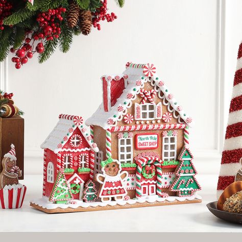 Iconic Festive DécorBring the holiday spirit into your home with the Member's Mark™ Pre-Lit Gingerbread Village. This iconic piece of décor radiates a festive quality that shines through its adorable design. Featuring gumdrop details with peppermint accents, it creates the look of a winter wonderland right in your living room.Flexible Display OptionsWhether you want to add a simple touch or spread holiday cheer throughout your home, this pre-lit gingerbread village is the perfect choice. Display one or all on your mantel, bookshelf, or any accent table to add the perfect finishing touch to your Christmas décor. It can also serve as a stunning centerpiece for fall-themed dinner parties, celebrations, and family gatherings.Convenient Timer FunctionSay goodbye to the hassle of turning the lig Gingerbread House Contest Awards, Gingerbread Tree Skirt, Gingerbread Table Decor, Gingerbread Village Display, Gingerbread Themed Christmas Decor, Pastel Gingerbread House, Gingerbread House Village, Christmas Shelf Decor, Gingerbread Contest