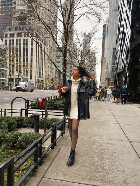 micro influencer modeling sweater dress w leather jacket in downtown chicago Sweater Dress Doc Martens, Doc Marten And Dress, Sweater Dress With Doc Martens, Doc Martens Dress Outfits, Doc Martens Dress, Dress And Doc Martens, Brown Doc Martens Outfit, Doc Marten Chelsea, Brown Doc Martens