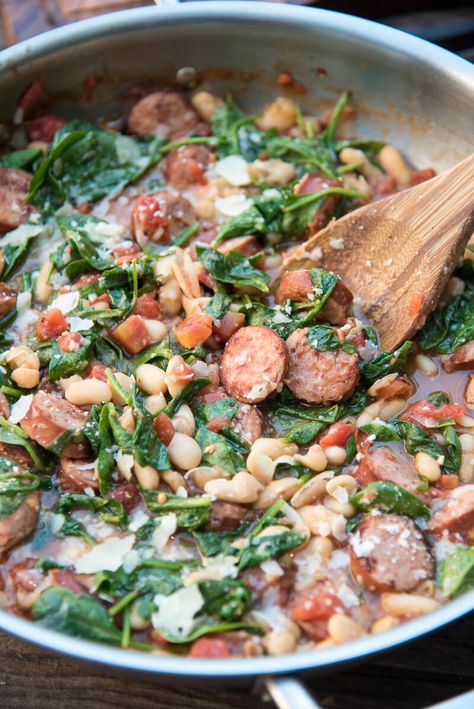 Hearty, comforting, and ready in 30 minutes! ~ https://www.fromvalerieskitchen.com Sausage And White Beans, Sausage Beans, Cherry Pie Bars, Healthy One Pot Meals, Sausage Spinach, Beans And Sausage, Sausage Dishes, Spinach Recipes, Skillet Meals