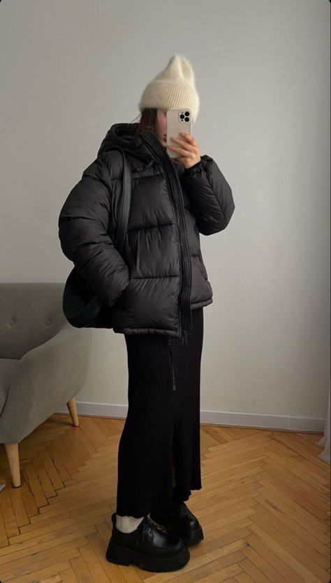 Puffer Jacket With Skirt Outfit, All Black Puffer Jacket Outfit, Long Black Skirt Outfit Winter Korean, Skirt With Puffer Jacket, Puffer Jacket And Skirt Outfit, Black Maxi Skirt Winter, Puffer Jacket With Skirt, Skirt And Puffer Jacket, Padded Coat Outfit