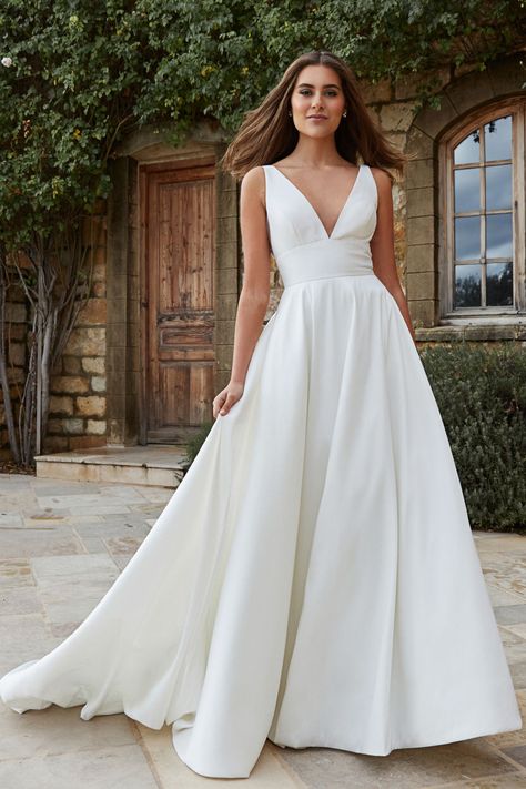 Backless minimalist taffeta ballgown with a defined waist, pockets. Classic Aline Wedding Dress, Cold Shoulder Wedding Dress, Jenny Yoo Bridal, Asymmetrical Wedding Dress, Wedding Dresses Near Me, Wedding Dress Silhouette, Navy Blue Bridesmaid Dresses, Minimalist Wedding Dresses, Affordable Wedding Dresses