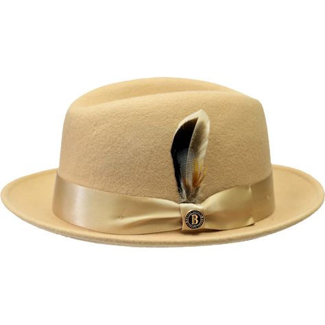 This center-dent hat is a perfect everyday accessory. Featuring a soft wool felt fedora designed with a center dent crown, trimmed with a sleek shiny ribbon hatband and a stingy snap brim, this fedora will get you through fall and winter in total style! And don't forget the interior is satin lined with a moisture-wicking cotton sweatband for a perfect fit! Brim: 1 7/8" Stingy Snap Material: 100% Fine Australian Wool Felt Crown Height: 4.5" Interior: Moisture-Wicking Cotton Sweatband Hat Band: 2-Tone 1.5" 16-Ligne Grosgrain Shape: Crushable Center Dent Interior: Satin Lined Removable B Logo Pin Feature: This hat comes with a size Adjustable string attached to Velcro. simply pull the built-in Adjustable String to your desired size and attach it to the Velcro. Homburg Hat, Felt Crown, B Logo, Logo Pin, Homburg, Gold Hats, Felt Fedora, Pin Logo, Hat For Man