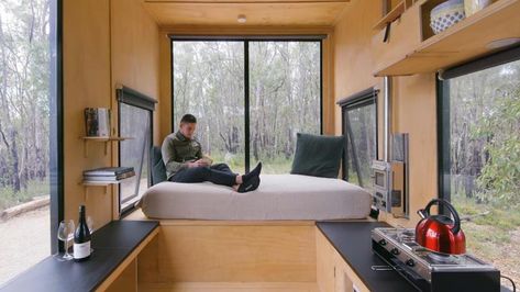 Take A Look Inside This Minimalist Tiny House With A King Size Sleeping Loft Bed Tiny House, Minimalist Tiny House, Black Roller Blinds, Tiny House Company, Art Deco Hotel, Small Fridges, Bed End, Sleeping Loft, Dubai Hotel