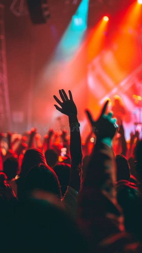 Lively concert crowd with hands in the air enjoying a music festival under bright stage lights. Perfect for capturing royalty free stock photos Festivals Aesthetic, Festival Advertisement, Vector Mountain, Concert Crowd, Stage Lights, Festival Image, Hands In The Air, Concert Aesthetic, Concert Festival