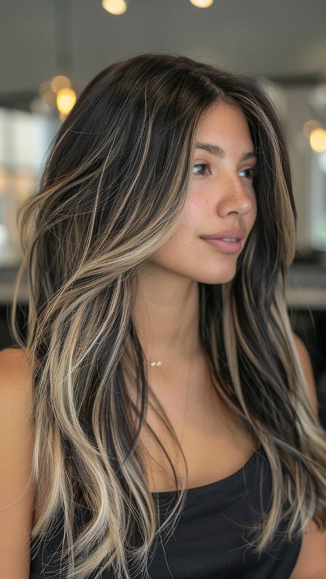 Discover a modern approach to enhance your dark hair with subtle balayage. Elevate your look with a touch of dimension and depth that beautifully complements your natural color. Whether you prefer soft highlights or gentle gradients, balayage offers a stunning solution for adding a fresh twist to black hair. Balayage Black, Soft Highlights, Balayage Caramel, Highlights For Dark Brown Hair, Blonde Highlights On Dark Hair, Black Hair Balayage, Subtle Balayage, Brunette Hair With Highlights, Black Hair With Highlights