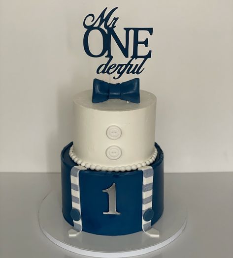 Mr. Onederful💙 Celebration cake for a ONEderful first birthday! 💙Flavour: Dunkaroo 💙 @mccallsbakers Gel food colours and fondant 💙 @starcreations.to Cake toppers 💙 @gayleafoodscoop #firstbirthday #first #birthdayboy #one #onederfulbirthday #blueandwhite #navyblue #bowtie #birthday #birthdaycake #twotiercake #suspenders #babyboy #boystyle #cakes #bramptonbaker #brampton Mr Onederful Birthday Cake Smash, Mr Wonderful 1st Birthday Cake, Mr Onederful Smash Cake, Mr Onederful Birthday Decoration, Mr Wonderful 1st Birthday, Mr Onederful Birthday Cake, Mr Onederful Birthday, Mr Onederful, Baby Birthday Decorations