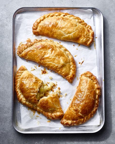 Cheese and onion pasties - delicious. magazine Bolognese Leftovers, Cheese And Onion Pasty, Cheap Recipe, Week Meals, Pasties Recipes, Cornish Pasties, Bigger Bolder Baking, Homemade Chips, Packed Lunches