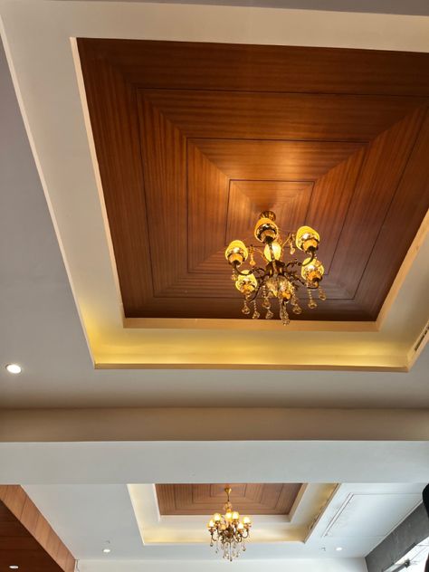 False Ceiling Unique Design, Foyer Wooden Ceiling, Tv Unit Double Height Wall, False Ceiling Wooden Designs, Pop Work On Wall, Wooden False Ceiling Design Living Rooms, False Celing Roof Design, Pvc False Ceiling Design For Living Room, Wooden Fall Ceiling