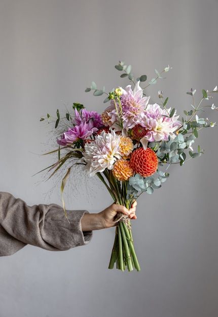 Free Photo | A woman is holding a festive bouquet with chrysathemum flowers in her hands. Flower Bouquet Photoshoot Ideas, Hand Holding Bouquet, Yellow Spring Flowers, Holding Bouquet, Flower Boquet, Giving Flowers, Portfolio Ideas, Flower Inspiration, Rose Vase