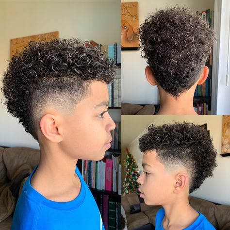 Burst fade mohawk with biracial hair.        (Cut by Drew at Mari’s Barbersalon in Indianapolis, IN) Biracial Mens Haircut, Mixed Kid Haircut, Biracial Men Hairstyles, African American Boys Haircut Trendy, Curly Faux Hawk Boy, Curly Hair Mohawk Fade, Fohawk Haircut Fade Curly, Mohawk Boys Curly Hair, Curly Hair Fade Boys