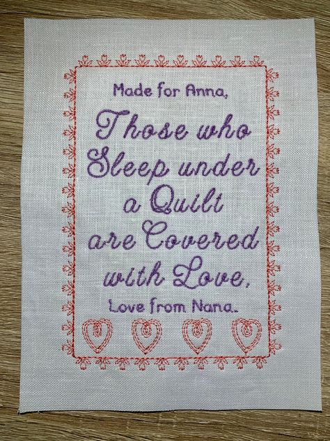 "A custom machine embroidered personalised quilt label is the perfect finishing touch to all your hard work. Your custom label will be a bespoke handmade quilt label made to complement your quilt. Message me for any help designing your thoughtful label which will honour your quilt for many years. This listing is for cute pink and purple quilt label. 4.5 inches wide by 6.5 inches high or 11.5 cm wide by 16.5 cm high.  Add your personalisation: In the personalisation box please enter the customisa Quilt Poems Quotes, Quilt Labels Ideas Sayings, Personalized Quilt Labels, Embroidered Quilt Labels, Custom Quilt Labels, Purple Quilt, Love Quilt, Quilting Quotes, Custom Woven Labels