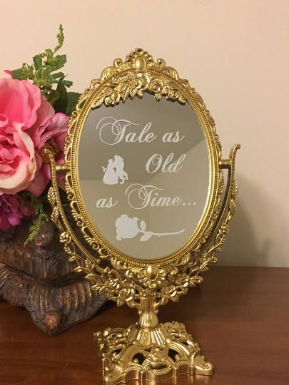 Ornate mirror with decal inscription/Tale as old as time mirror sign Mirror Sign Wedding, Wedding Mirror Sign, Fairytale Wedding Decorations, Beauty And Beast Birthday, Sweet 16 Party Decorations, Quinceanera Centerpieces, Beauty And Beast Wedding, Beauty And The Beast Theme, Fairytale Party