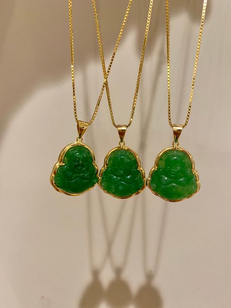 Nothing is better than wearing our abundant Buddha necklace everyday, let that money shine ✨💵 Jade is known for its wealth attracting properties and wisdom / calming properties. Information: ✨ The frame of the Buddha is made with Sterling Silver and plated with 14K Gold ✨ The Buddha is made with genuine green Jade 💚 ✨ Materials: .925 Sterling Silver (stamped) and plated with 14K Gold. ✨ Hypoallergenic ✨ Tarnish resistant This makes awesome gift for yourself if your looking to attract peace and Real Jade Necklace, Green Buddha Necklace, Buddha Jade Necklace, Gold Jade Necklace, Buddha Necklace Gold, Jade Buddha Necklace, Shoot Moodboard, Jade Necklace Pendant, Jade Buddha