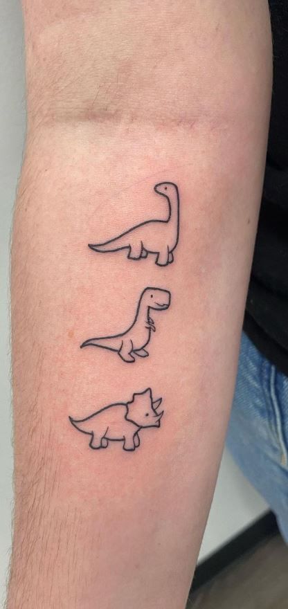 125 Dinosaur Tattoo Designs for the Dino Devotee - Tattoo Me Now Small Dino Tattoos Matching, Simple Tattoos Dinosaur, Three Dinosaur Tattoo, Pb And J Tattoo Best Friends, Dinosaur Tiny Tattoo, Dinosaur Simple Tattoo, Fresh Tattoo Ideas, Dino Tattoos Cute, 3 Dinosaur Tattoo