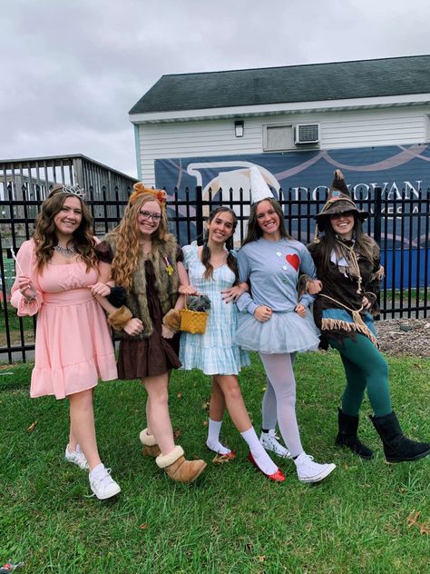 Dorthy Costume And Lion, Dorothy And Lion Couple Costume, Wizard Of Oz Inspired Outfits, Dorthy Wizard Of Oz Costume, Wizard Of Oz Trio Costume, Dorothy And Glinda Costume, Wizard If Oz Costumes Group, Diy Lion Costume Women Wizard Of Oz, Wizard Of Oz Costume Ideas For Women