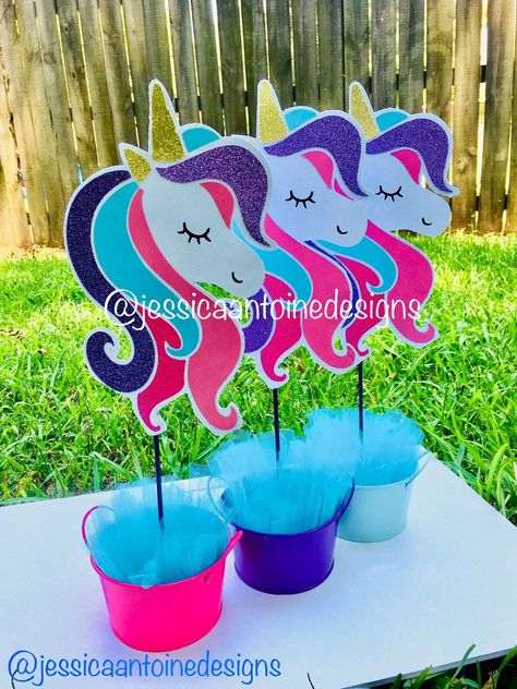 This one of kind piece will look so great at your next unicorn party. This centerpiece stake will add lots of color and drama to your unicorn party decor. This double sided unicorn is made using a mixture of premium card stocks and glitter card stock paper. This centerpiece stake is 20 inches high and 9 inches wide (measurements include the stick). This design is double sided. This centerpiece stake DOES NOT INCLUDE BLUE TULLE OR PAILS shown in pictures. The centerpiece stake arrives to you alre Pink Unicorn Party, Unicorn Baby Shower Theme, Unicorn Party Decor, Unicorn Centerpiece, Princess Birthday Decorations, Unicorn Birthday Decorations, Kids Painting Party, Jojo Siwa Birthday, Birthday Centerpiece