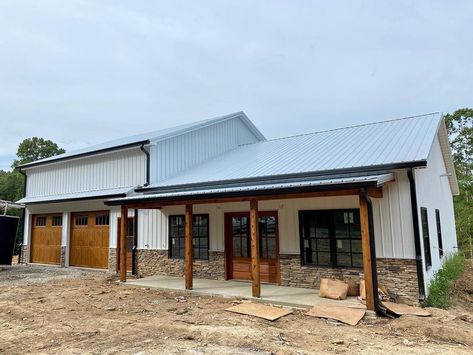 @spannhouse on Instagram: “Update on the exterior! Our garage doors and gutters have been installed and our stain is finished. I’m totally in love. I can’t wait to…” Shop And House Combo Plans, 40x60 Pole Barn House Plans, Barnodium Homes, Decorate For Spring, Cottagecore House, Metal House Plans, Cottage Porch, Pole Barn House Plans, Home Stretch