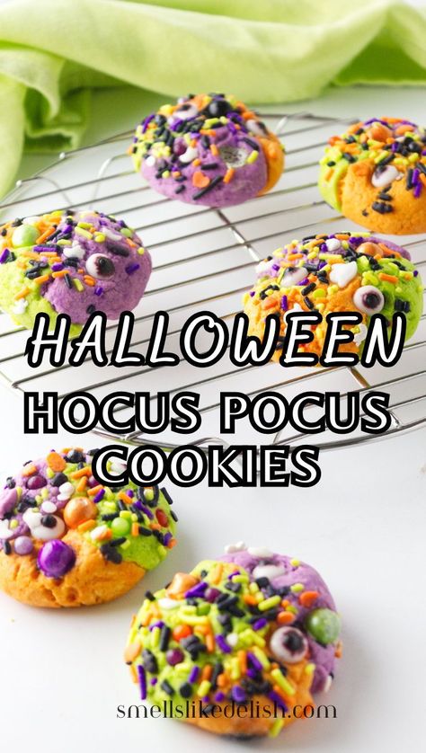 These Hocus Pocus Cookies are a simple sugar cookie recipe that color
 with food colors. Roll the cookies in sprinkles and add candy eyes for 
extra spooky, Hocus Pocus themed fun. 
Your kids will love showing these colorful sugar cookies off in their school lunches! Hocus Pocus Cookies, Simple Sugar Cookie Recipe, Colored Cookies, Halloween Snack Mix, Candy Eyes, Halloween Party Treats, Sugar Cookie Recipe Easy, Homemade Popcorn, Kid Approved Meals