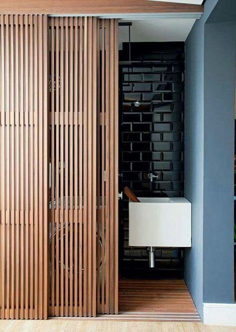 Sliding wooden doors for space-saving bathroom design Panelling Hallway, Ikea Hallway, Sliding Door Design, Interior Design Per La Casa, Upstairs Hallway, Ideas Ikea, Room Partition, Hus Inspiration, Hallway Ideas Entrance Narrow