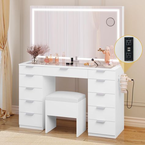 PRICES MAY VARY. Mdf Glass Tabletop Vanity: Unique tempered glass tabletop supports ample desktop space for display and facilitates a clear view of items stored in the drawer; Transparent design adds a touch of elegance to the dressing table, making it a great addition to any room 11-Drawer Makeup Vanity: Enjoy generous storage space with 11 drawers to amply accommodate all of your makeup, perfumes, hair tools, and essentials in a single vanity; Achieve both clutter-free storage and easy-reach f Clear Top Vanity Table, Vanity Desk With Clear Top, Make Up Tisch, Glass Top Vanity, Makeup Vanity Storage, Lighting Scheme, Dryer Rack, Makeup Vanity Set, Storage Bench Bedroom