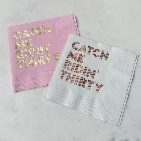 DESCRIPTION COLORS + DESIGNS NAPKIN INFO Our Custom "Catch Me Ridin' Thirty" Birthday Napkins feature stunning foil and fun phrase perfect for your new decade!! Pick your napkin, font, and foil/ink color so it's easy to coordinate with your party theme and decor. These are sure to elevate your 30th birthday and will WOW your friends/family! THANK YOU! Thank you so much for choosing Gracious Bridal Design House! We are honored that you appreciate our style, and want you to be wowed by our service and our product. When you receive your item, please leave us a review below! If anything is less than stellar, please contact us. Our goal is for you to have a fabulous experience. ••••• By purchasing this listing, you accept Gracious Bridal’s policies. All designs are copyrighted and the sole prop 29th Birthday Party Ideas For Her, Catch Me Ridin 30 Birthday, Thirty And Thriving 30th Birthday, Talk Thirty To Me Birthday Theme Decor, Flirty Thirty Birthday Ideas, 30s Birthday Theme, 29th Birthday Themes For Her, 35th Birthday Theme, 30 Theme Party Ideas Women