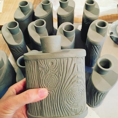 To all those grown up boy scouts who live by the motto "be prepared"... I've got you covered. Lumberjack flasks, restock in progress. #clay… | Instagram Ceramics Vessels, Carved Ceramics, Clay Totem, Ceramic Flask, Ceramic Bottles, Fire Shape, Slab Ceramics, Ceramic Texture, Pottery Handbuilding