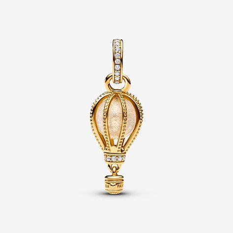 Reach new heights with the Sparkling Clear Hot Air Balloon Dangle Charm. This warm-toned charm is hand-finished in 14k gold plating. Beaded ropes encase a glittery transparent Murano glass, while the bail and base of the balloon are embellished with sparkling pavé. Below, a small gondola awaits to transport you to your destination. Wear it for daily inspiration or gift it to someone who is ready for their next adventure. Available in-store and online. - Pandora Sparkling Clear Hot Air Balloon Da Pandora Essence, Custom Charm Bracelet, Pandora Gold, Rose Gold Plated Ring, Charms Pandora, Solid Gold Necklace, Beaded Rope, Pandora Bracelet Charms, Custom Charms