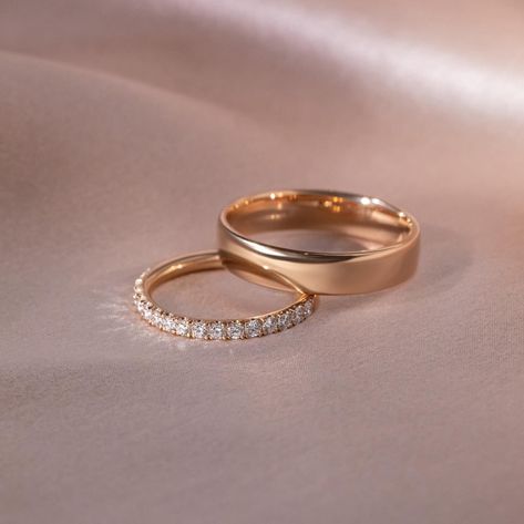 Exquisite Pairs ✨ Wedding band pairs for a couple have a deep-rooted history. The tradition dates back to ancient Egypt, around 3,000 BCE. The Egyptians are known to be the earliest users of rings to symbolize love and commitment. They crafted rings from materials like braided reeds, hemp, or leather, which were later replaced by more durable metals. The circular shape of the ring, with no beginning or end, symbolized infinity, and was traditionally worn on the fourth finger of the left han... Christian Wedding Rings, Wedding Band Couple, Christian Wedding Dress, Couple Together, Couple Ring Design, Couples Wedding Bands, Engagement Rings Couple, Bespoke Rings, The Romans