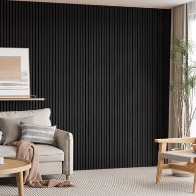 Create a tranquil and unique space with our acoustic wall panels. Say goodbye to noise and chaos and embrace serenity and harmony. Our acoustic wall panels are not only focused on aesthetics but also on creating an environment where sound can be perfectly controlled. What's Included? 1 Piece wall panel with 106" x 12.6". COMFORTHOMI Color: Black Oak | COMFORTHOMI 106" x 12.6" 3D Acoustic / Sound proof Wood Slat Wall Panel blackLaminate in Black Oak | 106" H X 12.6" W | Wayfair Black Wall Home Office, Slats On Wall Living Rooms, Accent Wood Panel Wall, Black Wood Slat Fireplace Wall, Sound Proof Wall Design, Bar Panelling, Sound Proof Ceiling, Sound Dampening Decor, Acoustic Wall Panels Sound Proofing