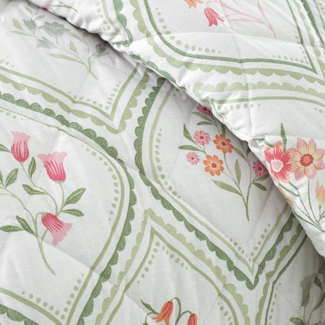 Capture the essence of the cottage core aesthetic with this delicate cameo floral pattern in soft, muted tones. Fully reversible with of classic ribbon florals and stripes to bring a touch of vintage charm. Created from easy-care recycled polyester and soft responsibly sourced cotton, blended together for everyday use. Quilted for added style and comfort, perfect for added insulation during sleep. Laundry Gifts, Floral Bedspread, Catherine Lansfield, Cottage Aesthetic, Cottage Core Aesthetic, Muted Tones, Quilted Bedspreads, Reversible Quilt, The Cottage