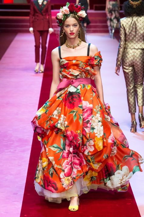 Dolce & Gabbana turns up the glam factor with the Italian brand’s spring-summer 2018 runway show. Showcasing over one hundred looks total, the collection was dubbed ‘Queen of Hearts’ with playing cards covering clothing as well as the show’s backdrop. Opening with a selection of all black looks, Dolce & Gabbana focused on lingerie inspired... [Read More] Tulle Ball Gown, Milano Fashion Week, Fashion 2018, Fashion Show Collection, Mode Vintage, Dolce & Gabbana, Mode Style, Italian Style, Italian Fashion