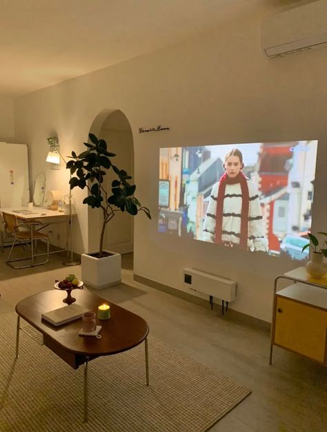 Cozy Simple Apartment, Projector In Studio Apartment, Living Room Designs With Projector, Living Room Asthetics Small, Nordic Studio Apartment, Nyc Studio Apartment Ideas Small Spaces, No Wall For Tv In Living Room, Projector Living Room Set Up, Small Living Room Projector Ideas