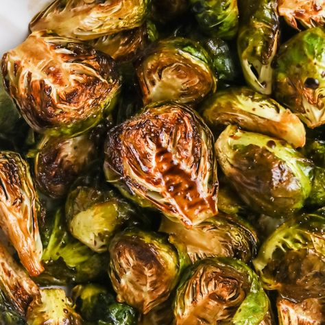 Honey Balsamic Brussels Sprouts (Only 5 Ingredients!) Honey Balsamic Brussel Sprouts, Balsamic Brussels Sprouts, Balsamic Brussel Sprouts, Honey Balsamic, Vinegar And Honey, Balsamic Glaze, Pomegranate Seeds, 5 Ingredient, Oven Roast