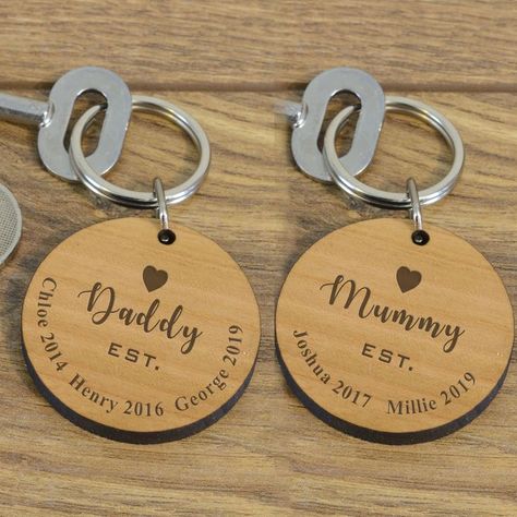 A lovely keyring made from cherry wood. Just choose the  recipient (eg Mummy) and add the names and years of the children to complete the design.  The keyring size is 40mm x 40mm and 5mm thick. Small tags 40mm x 10mm x 5mm.  It comes in a lovely drawstring bag. You can pay online with a card, by phone, by cheque, by BACS (online Banking) or by Amazon. More Personalised K eyrings DSCKR030 Shelves Design Ideas, Laser Gifts, Wall Decorating Ideas, Foyer Wall, Glowforge Projects, Shelves Design, Personalised Keyrings, Laser Cut Wood Crafts, Wall Decorating