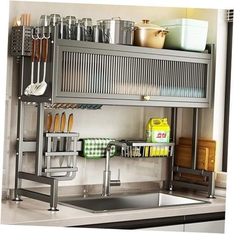 Return Policy Fast Delivery Trusted seller Over the Sink Dish Drainer Drying Rack 3 Tier Over Sink Dish rack for a Tidy Kitchen Sink Shelf Organized Space-Saving Dish Rack with Cover for Dishes, Glasses, Bowls, and Cutlery Product Description 【Innovative Design with Cover】: Our Exclusive Over-the-Sink Dish Drying Rack with Cover combines functionality with elegance. Keep your kitchen pristine, showcg a sleek design that not only provides an extra layer of protection for your drying dishes but also adds a touch of beauty to your space. 【Premium Quality and Durability】: Crafted from high-quality materials, our over the sink drying rack is built to last. The sturdy construction ensures stability and durability, even when supporting heavy dishes. The rust-resistant coating s long-lasting perfo Kitchen Sink Shelf, Kitchen Dish Drainers, Large Kitchen Sinks, Sink Drying Rack, Above Sink, Kitchen Shelves Organization, Kitchen Sink Storage, Sink Dish Rack, Sink Shelf