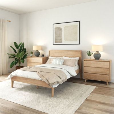 With its minimal design and low-profile silhouette, this platform bed brings modern elegance to your sleep space. It's made from solid and engineered wood, and it rests on sleek, tapered legs that keep sightlines clear. We love that the rectangular panel headboard showcases a slatted design for plenty of contrast, while the footboard makes sure your blankets stay off the floor. There's also room underneath to tuck away boxes and bins for out-of-sight storage. Best of all, a box spring isn't requ Blonde Queen, Wood Panel Bed, Lit King Size, Bed Queen, Wood Bed Frame, King Bed Frame, Queen Bed Frame, Solid Wood Bed, Wooden Bed Frames