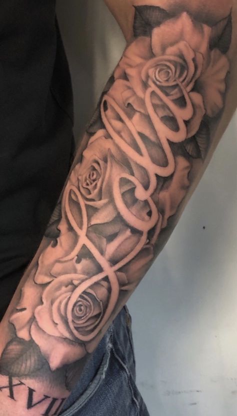 Name Tattoo On Inside Of Arm, Name Tattoo With Roses Forearm, Negative Space Name Tattoo, Names With Roses Tattoos, Her Name Tattooed On Him, Name Tattoos Sleeve, Big Name Tattoos On Arm, Sleeve Tattoo For My Daughter, Name In Rose Tattoo