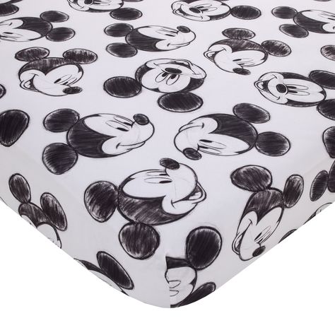 Your little one will love this Disney Mickey Mouse Fitted Crib Sheet. Features a playful allover charcoal drawing pattern of Mickey Mouse with his warm smile in shades of black and white. Includes full elastic edges for a safe and snug fit. Made of cozy soft fabrics and measures 28" x 52" x 8". Fits a standard size crib/toddler mattress. Machine washable for easy care. Imported The perfect touch for any Disney nursery! Mickey Mouse Nursery, Baby Boy Cribs, Boys Crib, Baby Crib Sheets, Disney Nursery, Mini Crib Sheets, Drawing Pattern, Toddler Mattress, Mini Crib