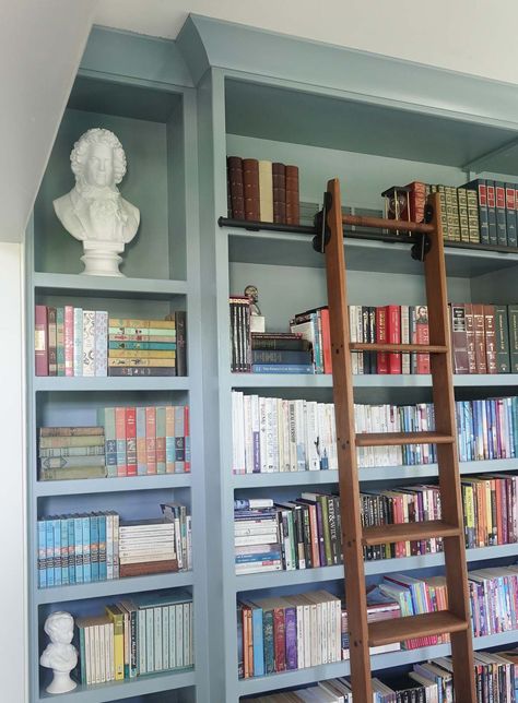 Painted Wall Bookshelves, Blue Library Bookshelves, Blue Bookcase Living Room, Light Blue Built In Bookcase, Blue Built In Bookshelves, Light Blue Bookcase, Blue And White Library, Blue Bookshelves Living Room, Painted Library Shelves