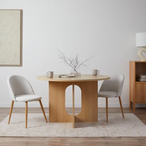 With its sleek design and Scandi aesthetic, this table is the epitome of contemporary minimalism. Measuring 120cm in diameter, it provides ample space for intimate family dinners.
The sturdy design and unique base cutout add a touch of sophistication to any modern dining area.  
Style Tip: Pair with neutral tones and decorative twigs to create a Japandi-inspired space.

#japandi #modernhome #homestyle #homeinspiration #cozyhome #interiorstyling #homegoals #interiordecor #homedetails #luxuryhomes Scandi Aesthetic, Office Storage Furniture, Contemporary Dining Table, Scandi Design, Australian Homes, Family Dinners, Modern Dining Chairs, New Living Room, Kitchen Dining Furniture