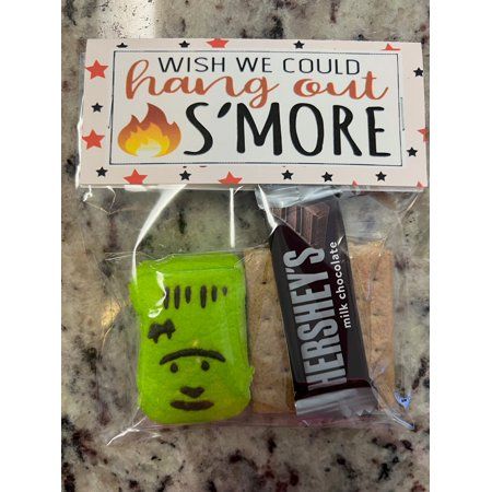 Prepare for a spooktacular Halloween with our Spooky S'mores Halloween Treat Bags, the perfect treat for goblins, ghosts, and ghouls of all ages! These adorable bags are filled with all the essential S'mores ingredients you need for a sweet and hauntingly delicious experience. What's Inside: - Mini Hershey's Milk Chocolate Bar: Rich and creamy, it's the perfect chocolatey foundation for your S'mores creation. - Peeps Marshmallow Ghost, Pumpkin, Monster and Sugar Skull: These ghostly marshmallows Smores Baggies, Smores Bags Favors, Halloween Smores Treat Bags, Halloween Treat For School, Halloween Treat For Coworkers, Kids Halloween Goodie Bags, Adult Halloween Goodie Bags, Smores Treat Bags, Halloween School Treats Bags