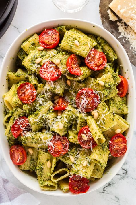 This delicious Pesto Pasta with Roasted Tomatoes features vibrant basil pesto and juicy roasted cherry tomatoes for a delightful combination of flavors – a quick and flavorful dinner option ready in under 20 minutes. Transform your weeknight meals with this easy pasta dinner! Pasta With Roasted Tomatoes, Basil Pasta Recipes, Easy Pesto Pasta, Basil Pesto Pasta, Roasted Tomato Pasta, Creamy Pesto Sauce, Basil Pesto Recipes, Flavorful Dinner, Tomato Basil Pasta