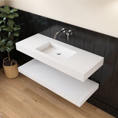 This wall-mounted bathroom Vanity with shelf is gonna look great in any bathroom style. Simple yet sophisticated, this modern sink is designed to look as if it is floating in your bathroom. Its standard rectangular design with clean lines works well in many bathroom decor configurations and setups. Made with high-quality and durable solid surface material, this sink features a clean and consistent color throughout as well as durable construction to ensure lasting quality and appearance. The surf Floating Sink Bathroom Small Spaces, Vanity Design Modern, Floating Sink Bathroom, Bathroom Vanity With Shelf, Vanity With Shelf, Floating Sink, Contemporary Home Interior, Industrial Kitchen Lighting, Wall Mounted Bathroom Vanity