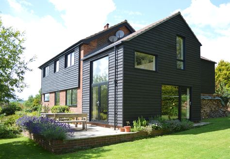 Extension & Refurbishment of 1960s Property by ArchitectureLIVE https://www.homify.co.uk/ideabooks/23923/beautiful-black-cladded-home-west-sussex 60s House, 1960s House, 70s House, Exterior House Remodel, 1960s Home, House Cladding, 1970s Home, Contemporary House Exterior, 70s Home