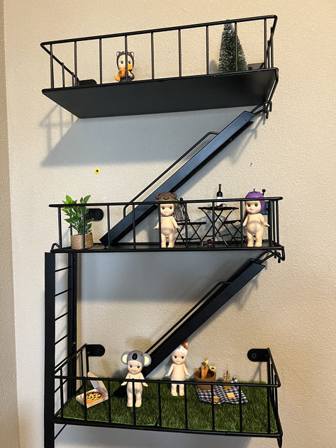 You can't tell me this isn't the cutest thing ever! The shelf and little accessories are linked below! Fire Escape Decor, Fire Escape Shelf, Staircase Shelves, Angel Shelf, Figures Display, Pinterest Room, Living Room Transformation, Bored Board, Unique Shelves